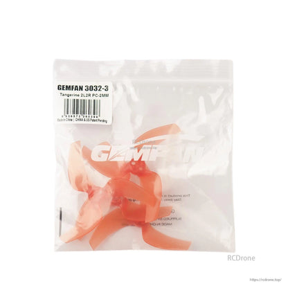 Gemfan 3032-3 tangerine orange propellers in retail bag with label showing 2L2R PC-2MM