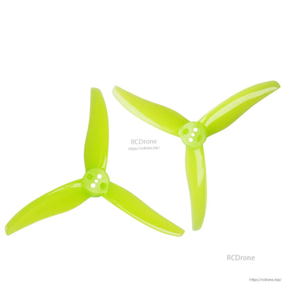 Pair of neon yellow tri-blade propellers, matching set shown side by side
