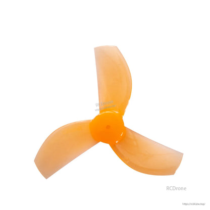 Translucent orange 35mm 3-blade whoop propeller, top view