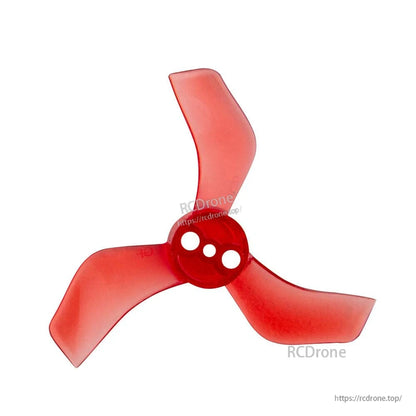 Translucent red 3-blade propeller close-up, tri-blade shape and three-hole mounting hub