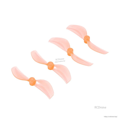 Peach translucent 45mm two-blade whoop propellers, 4-piece set on white background