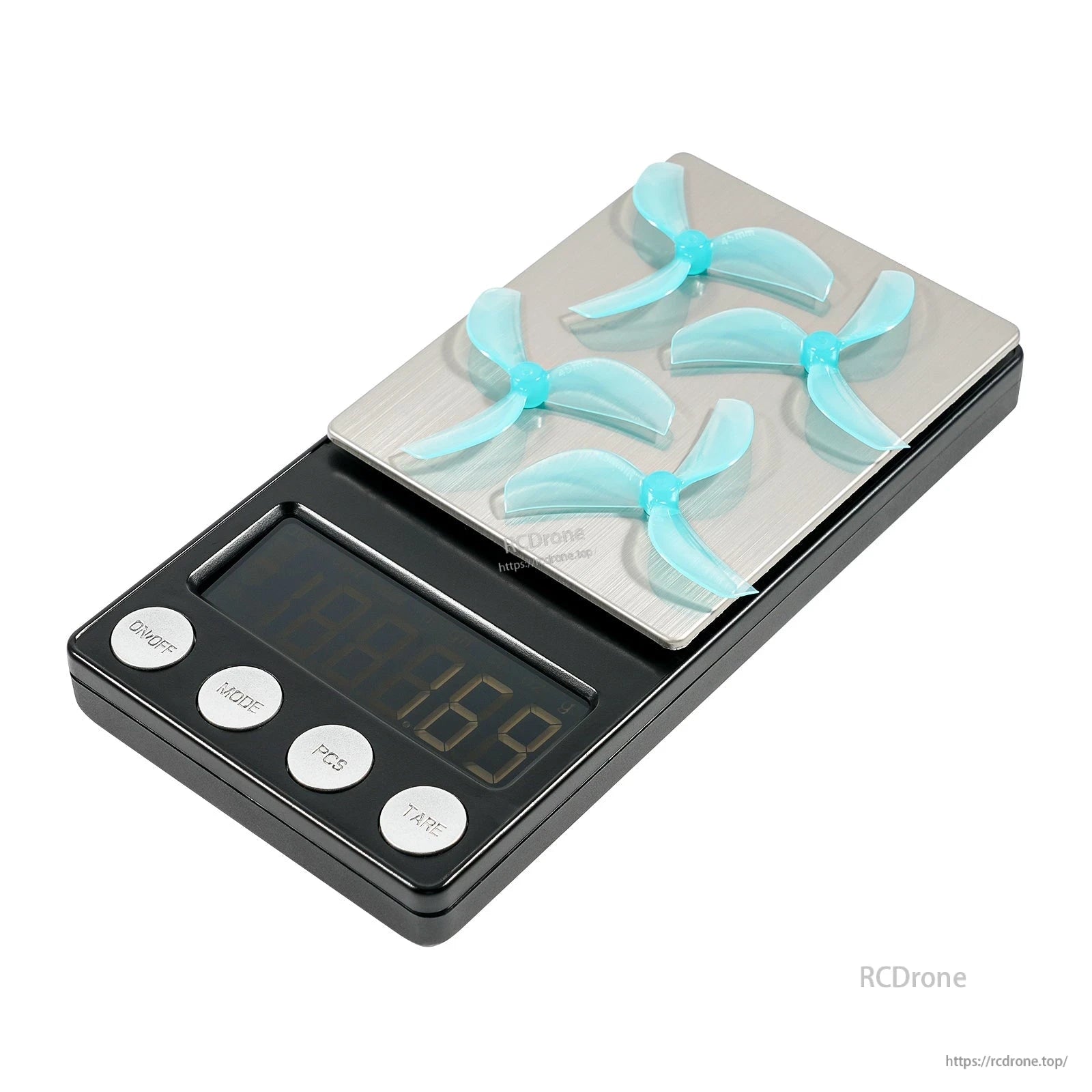 Four cyan three-blade propellers placed on digital scale, angled view with buttons visible