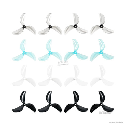Three-blade propeller assortment in clear, cyan, white, and black colors shown in grid