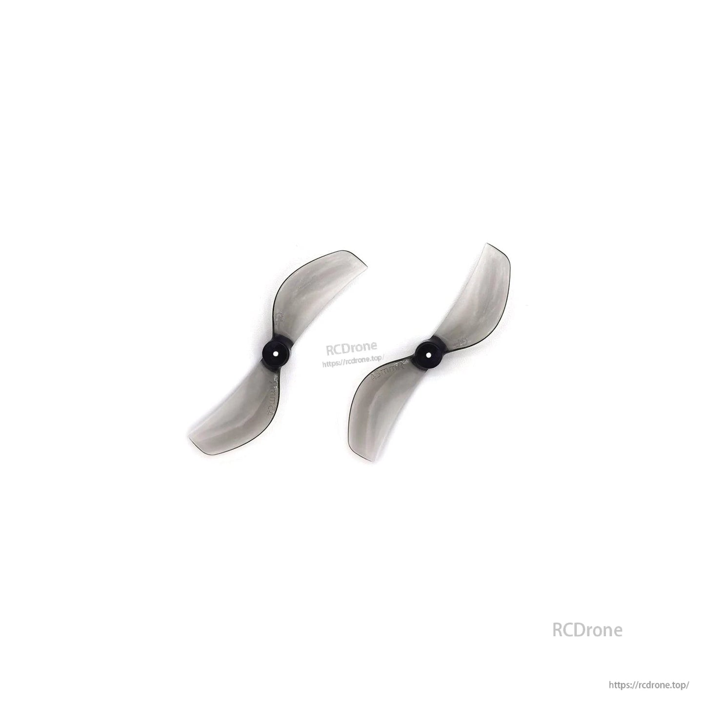 Pair of smoke gray 2-blade propellers displayed side by side on white background
