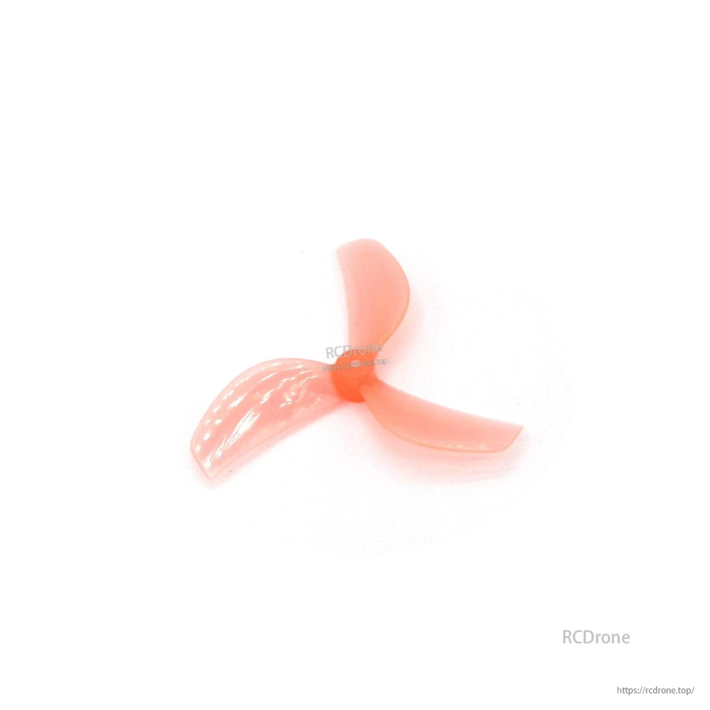 Translucent red 3-blade propeller, lighter shade angled view showing molded blade texture
