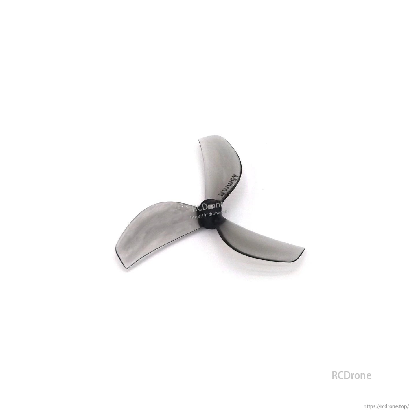 Clear gray 3-blade propeller, angled view with Gemfan marking visible on blade