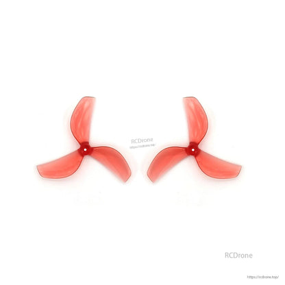 Pair of translucent red 3-blade propellers shown side by side, matching set