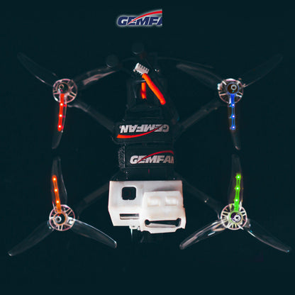 Gemfan 51433-3 Starlight LED 3-blade propellers installed on FPV quad, multicolor LEDs in low light