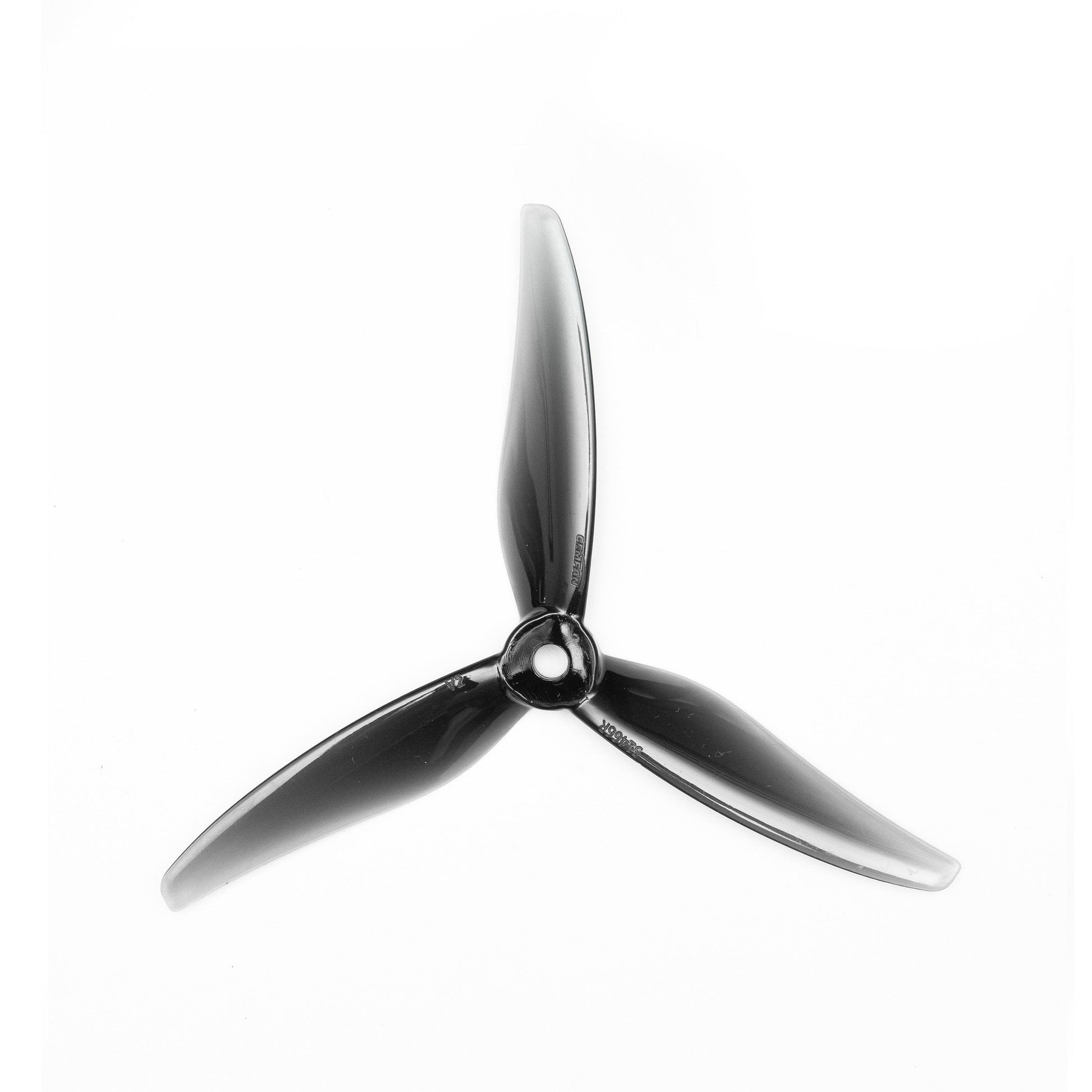 Black 3-blade propeller close-up on white background, showing hub opening and blade shape