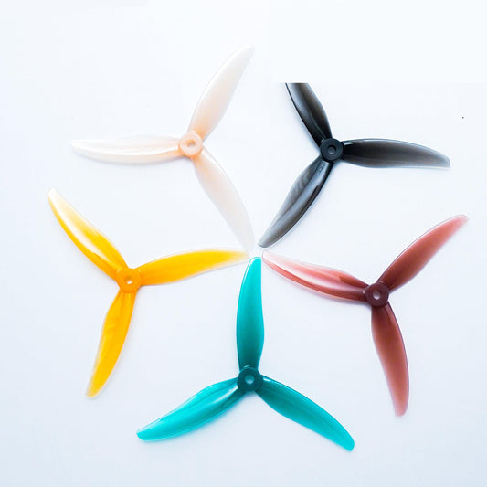 Gemfan 5.1x3x3 Freestyle 3S 3-blade propeller set in mixed colors on white background