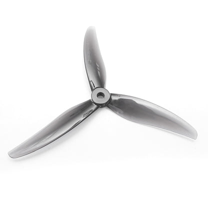 Dark gray 3-blade Gemfan 5.1x3x3 freestyle propeller, top view showing hub and blade profile