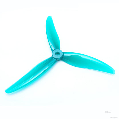 Teal 3-blade FPV drone propeller, top view showing blade shape and center hub opening