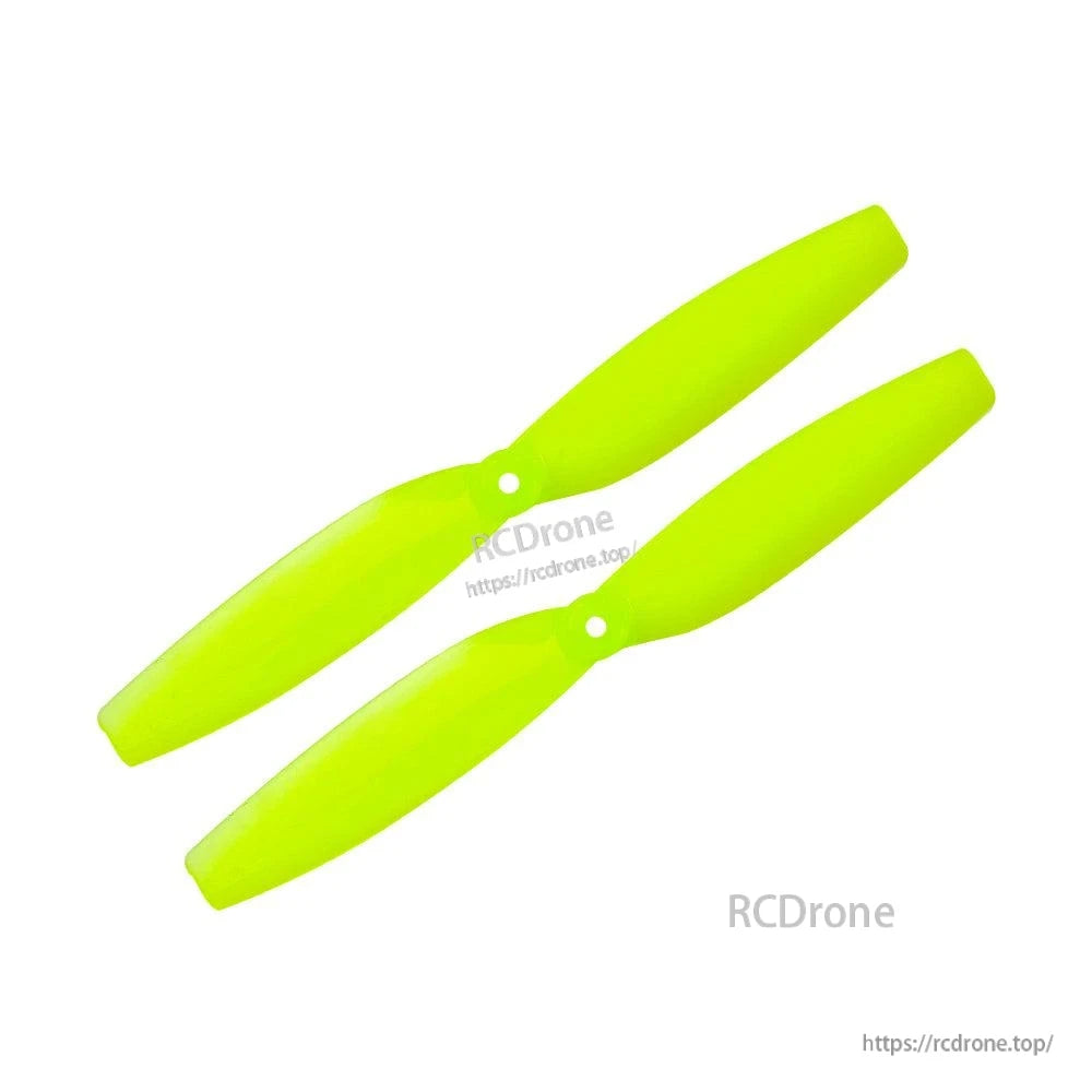 Neon green two-blade propeller pair for toothpick drone, top view on white
