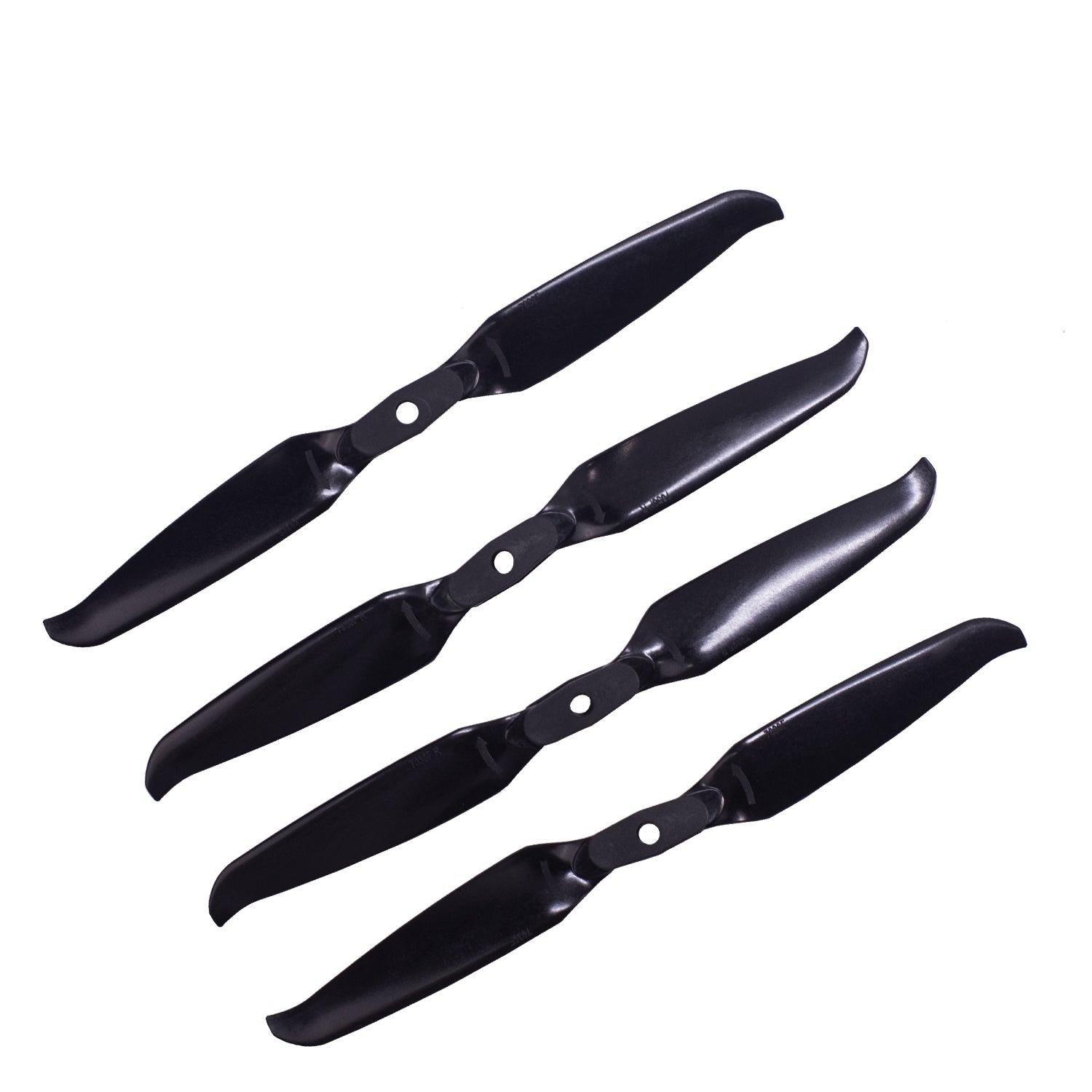 Set of four black 7in two-blade drone propellers with center mounting holes, top view
