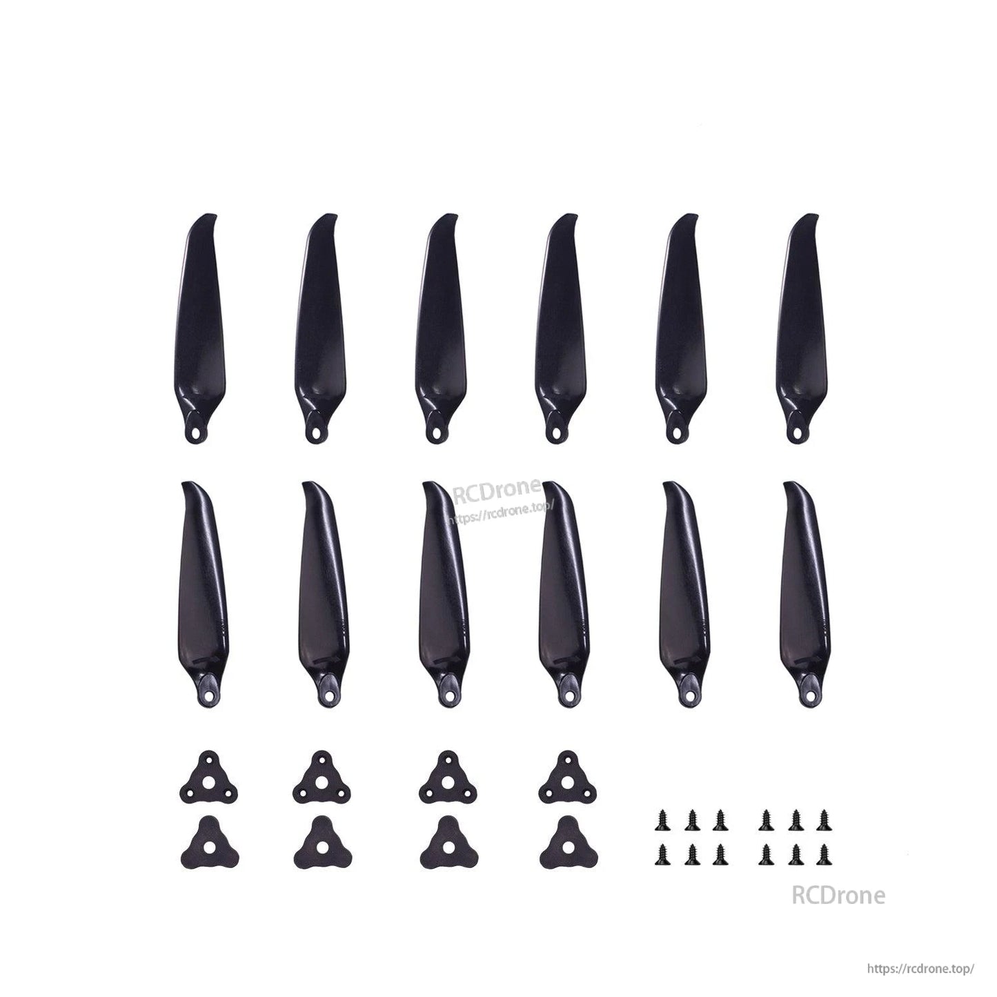 Propeller set contents laid out: black folding blades, hub plates and mounting screws