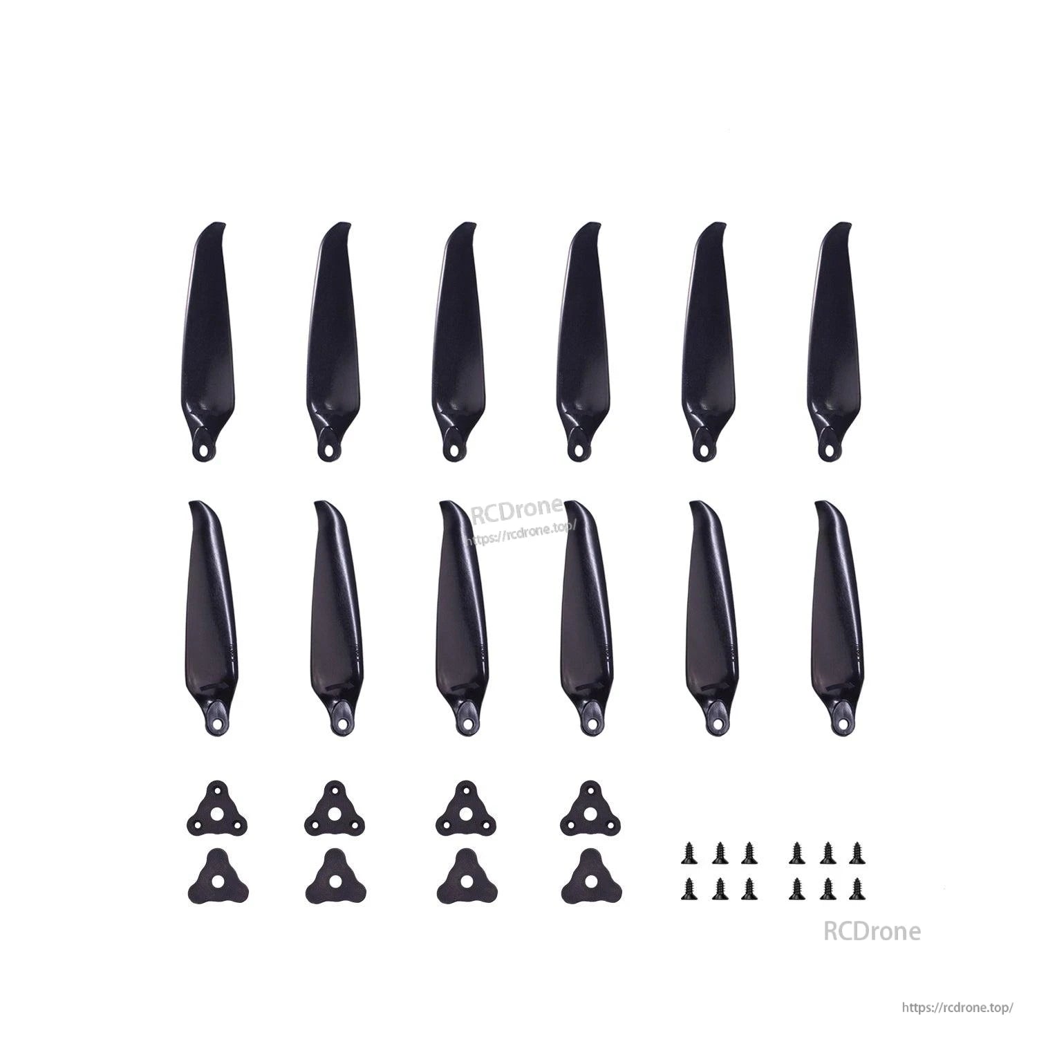 Propeller set contents laid out: black folding blades, hub plates and mounting screws