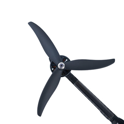 Gemfan 7037-3 Carbon Nylon 3-Blade Propeller mounted on drone motor, close-up of hub and blades