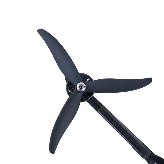 Gemfan 7037-3 Carbon Nylon 3-Blade Propeller mounted on drone motor, close-up of hub and blades