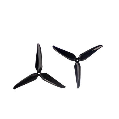 Pair of black tri-blade drone propellers shown side by side, top view with center mounting holes