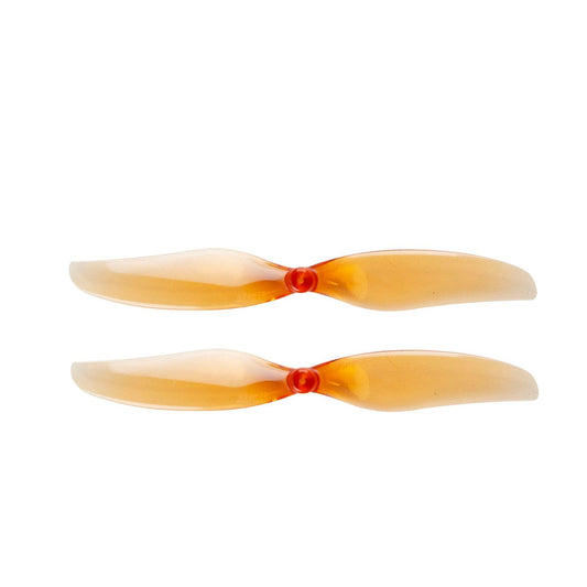 Gemfan 75MM-2 propeller pair in translucent orange with red hub, top view
