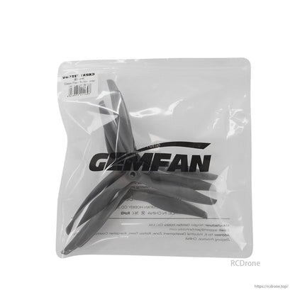 Back view of Gemfan-branded bag with propellers inside, label area visible in top left corner