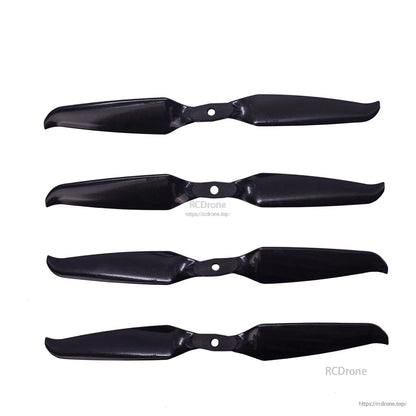 Four Gemfan 8041F-2 folding propellers laid out flat, showing blade shape and mounting holes