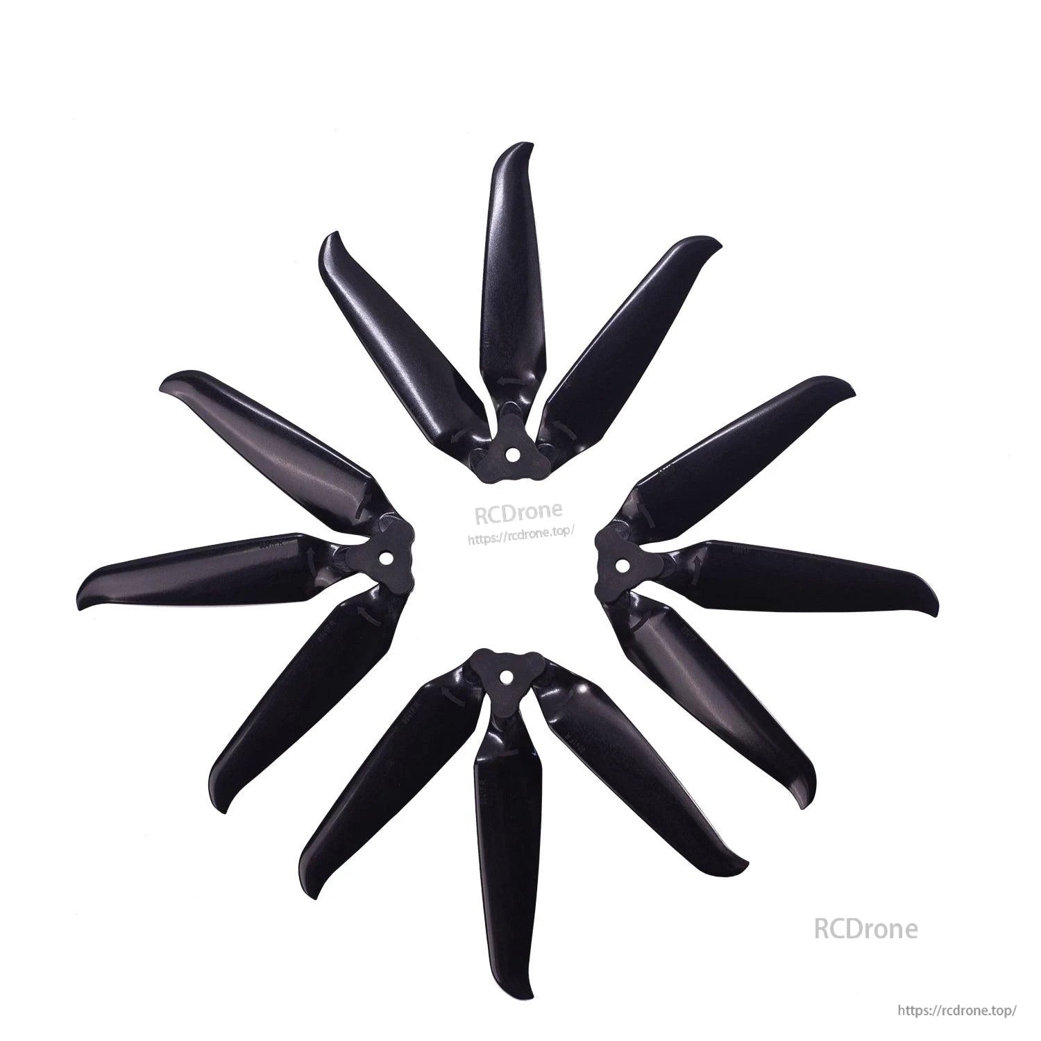 Multiple assembled 3-blade propellers arranged in a circle pattern on white background