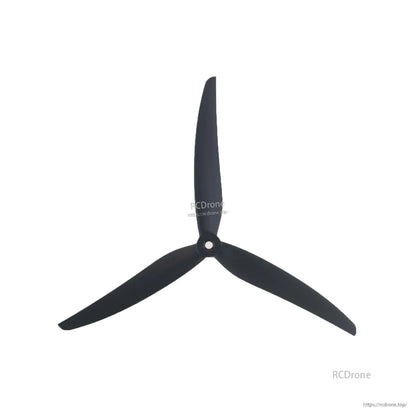 3-blade propeller close-up showing hub and blade shape, black finish on white background