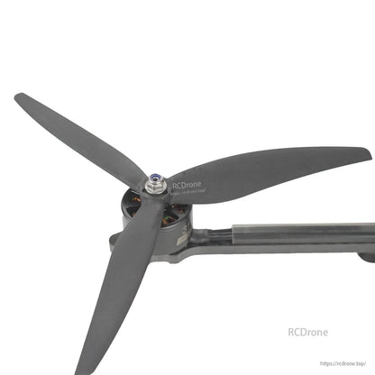 Gemfan 9046-3 tri-blade prop mounted on drone motor arm, close-up installed example