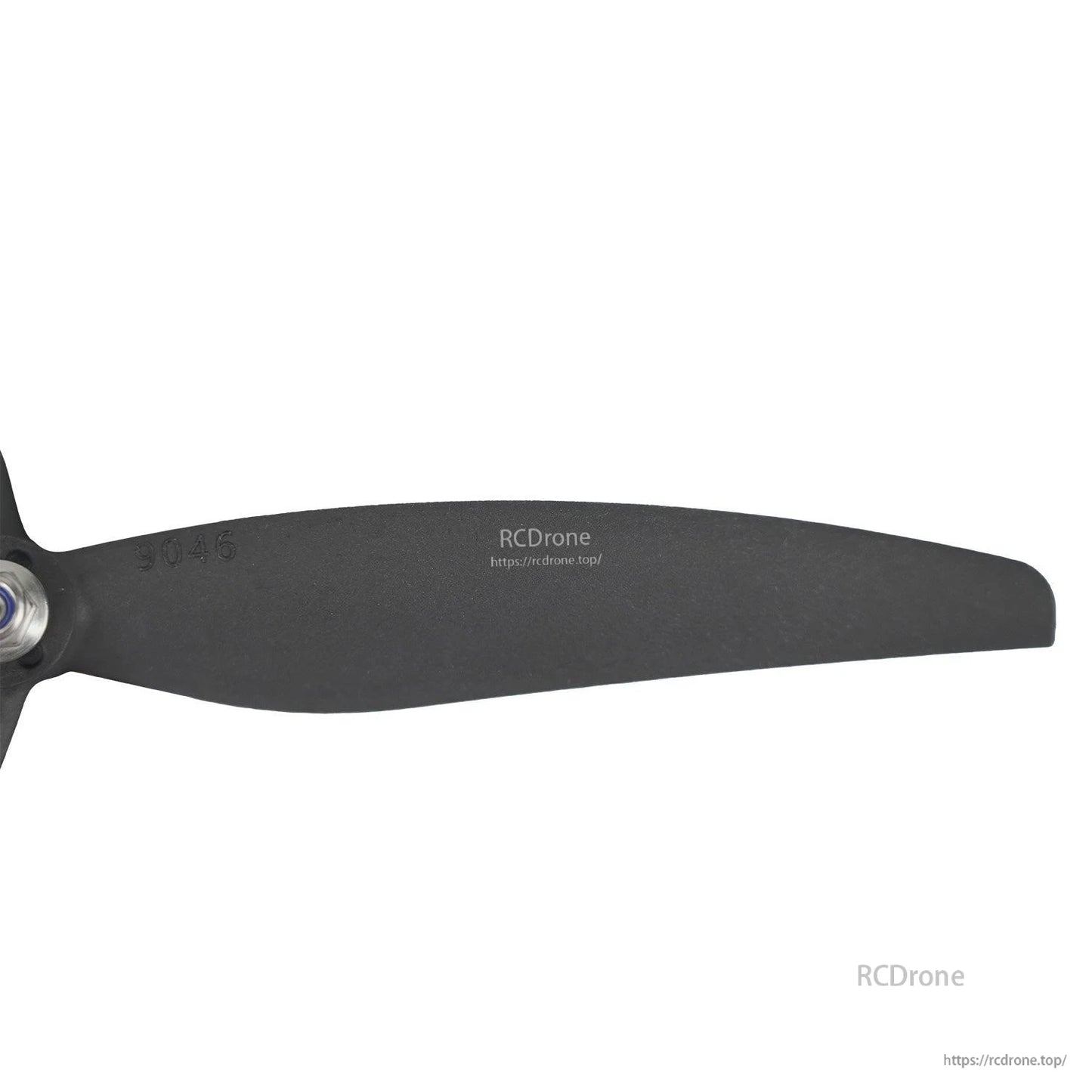 Propeller blade close-up with molded 9046 marking and surface texture detail