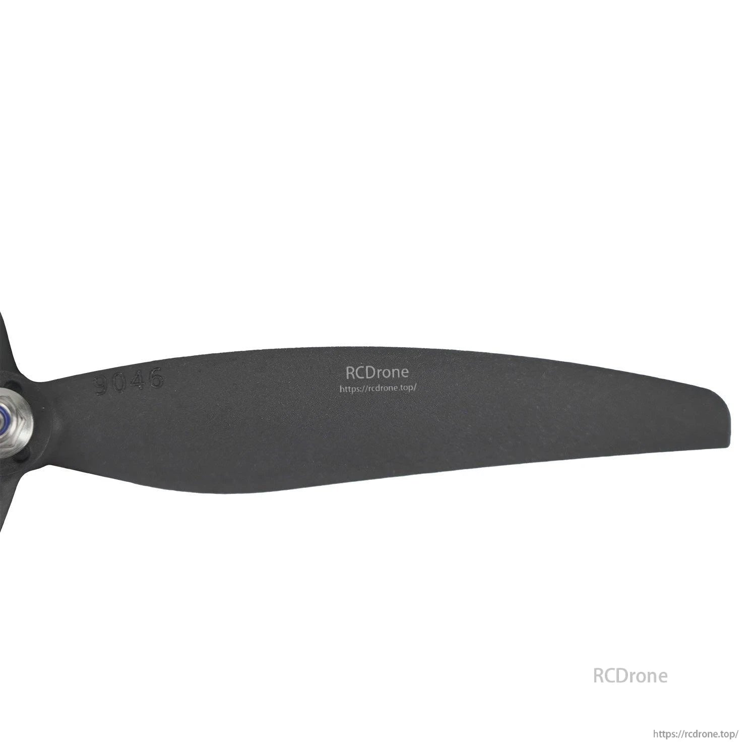 Propeller blade close-up with molded 9046 marking and surface texture detail