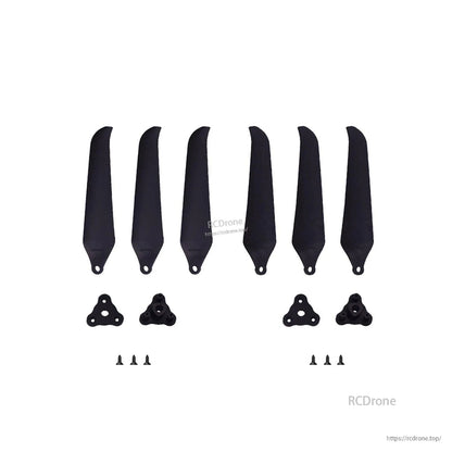 Gemfan 9046F-3 propeller set contents: loose blades, hub adapters, and screws laid out