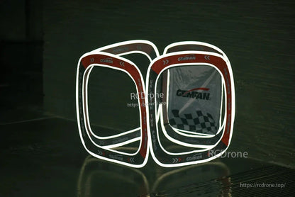 FPV racing gate cube shown in dark setting with reflective edge outlines for visibility