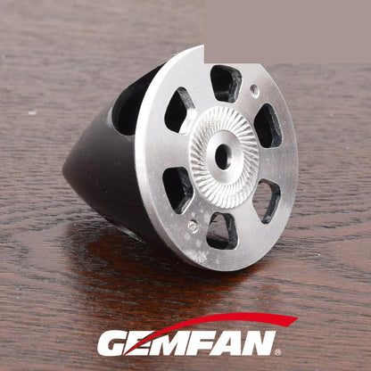Rear/underside view of Gemfan CNC aluminium backplate with nylon spinner body, vented plate