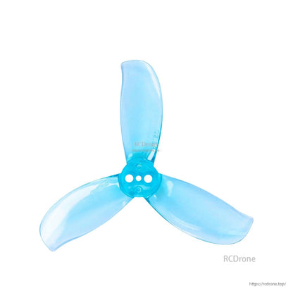 Single 3-blade FPV propeller in clear blue, top-down view with three mounting holes