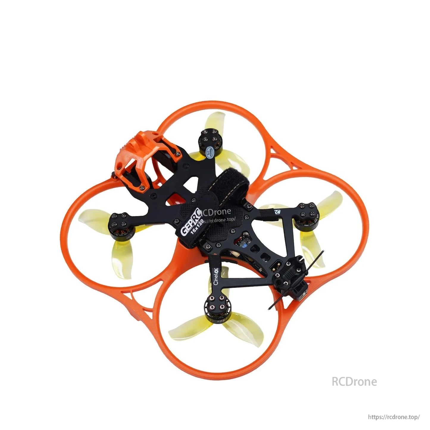Cinewhoop drone with orange ducts using translucent yellow tri-blade props, top view
