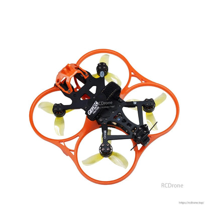 Cinewhoop drone with orange ducts using translucent yellow tri-blade props, top view