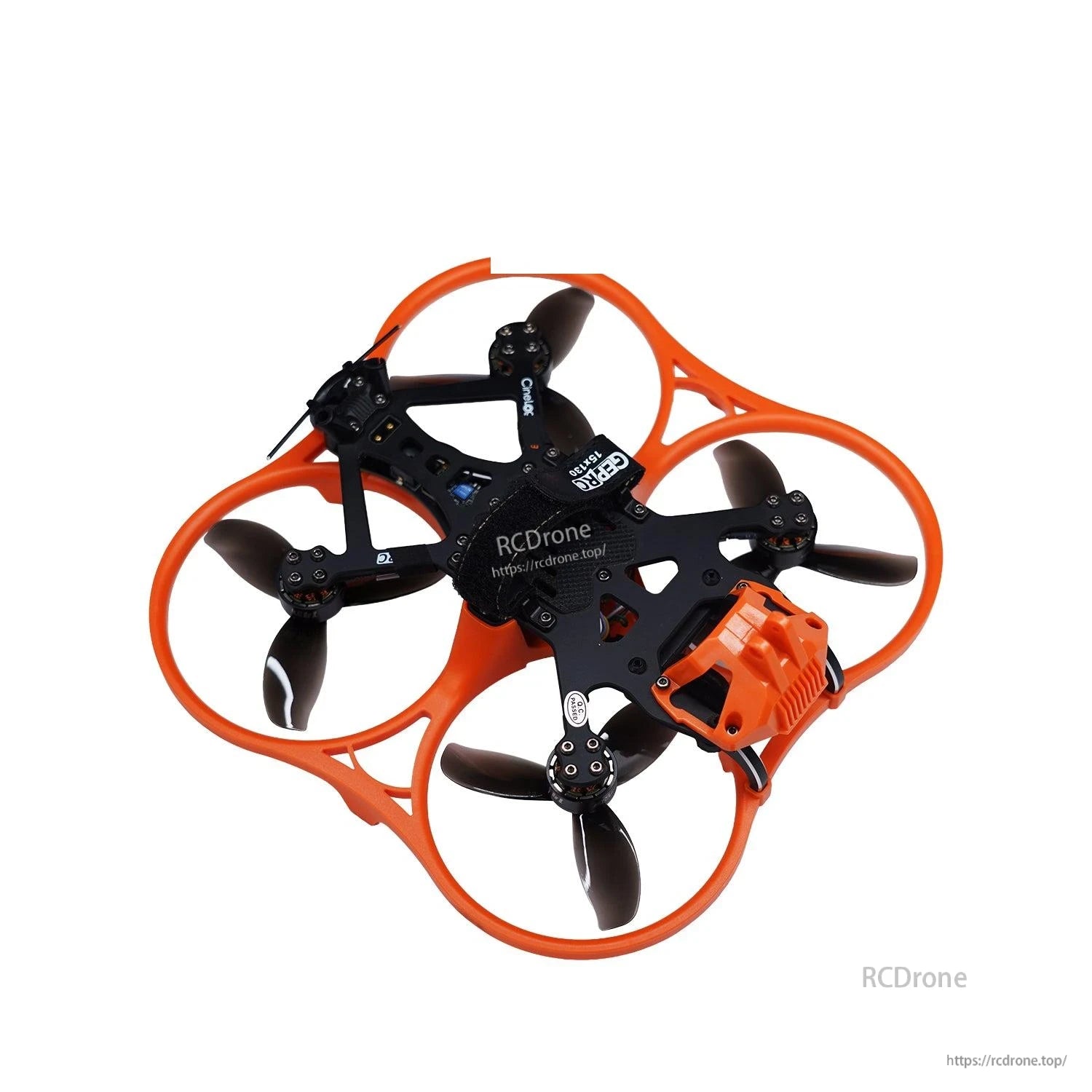 Ducted FPV quadcopter with orange prop guards using black 3-blade props installed on all motors