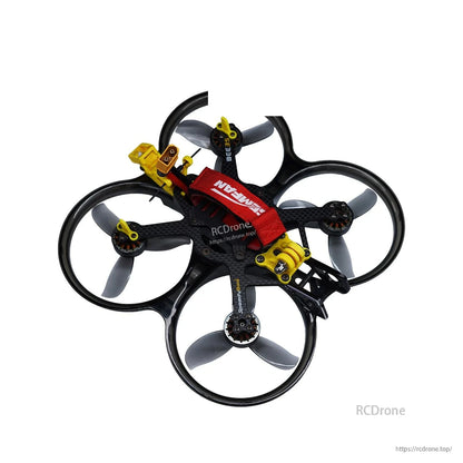 Ducted quadcopter shown with dark gray tri-blade propellers installed in circular ducts