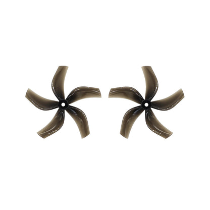 Pair of smoke black 5-blade 4-inch drone propellers on white background, top view
