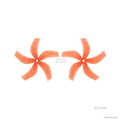 Pair of orange 5-blade 4-inch drone propellers with center mounting hole, top view