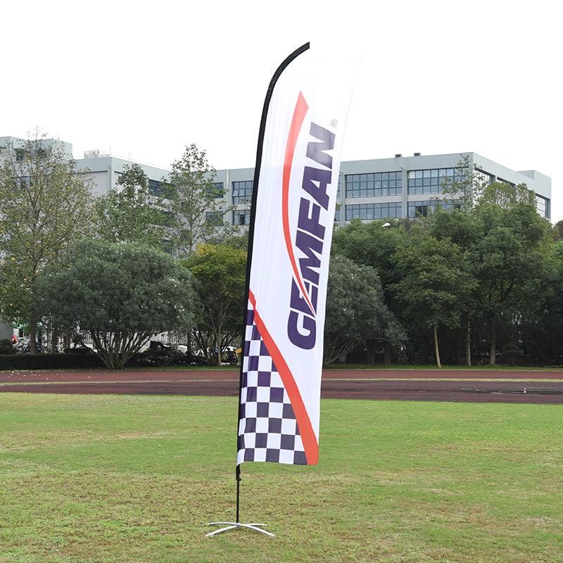 Gemfan Flag-L4.6M folding flag banner kit set up on grass field with curved pole and base