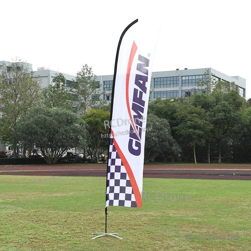 Tall feather flag banner on outdoor field, GEMFAN print with checkered lower panel and curved top