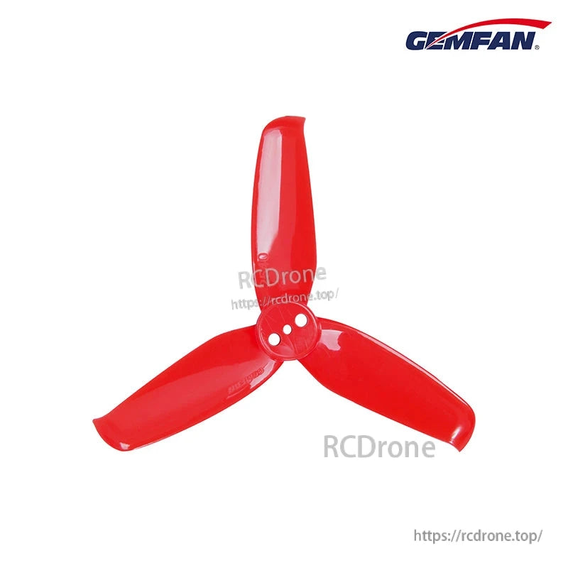 Red three-blade drone propeller, 3-hole mounting hub, glossy finish on white background