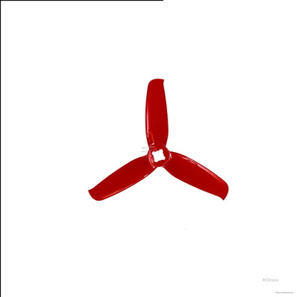 Red 3-blade drone propeller, close-up top view
