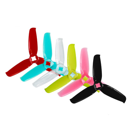 Gemfan Flash 3052-3 PC 3-blade propellers shown in assorted colors (red, teal, clear, yellow, pink, black)