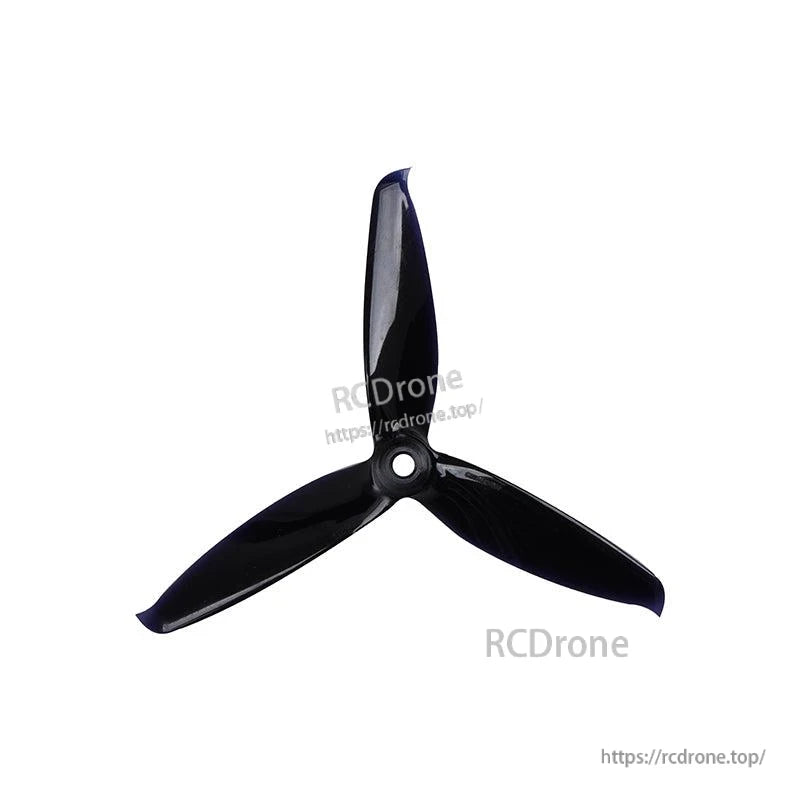 Black tri-blade propeller top view showing glossy blades and circular center mounting hole