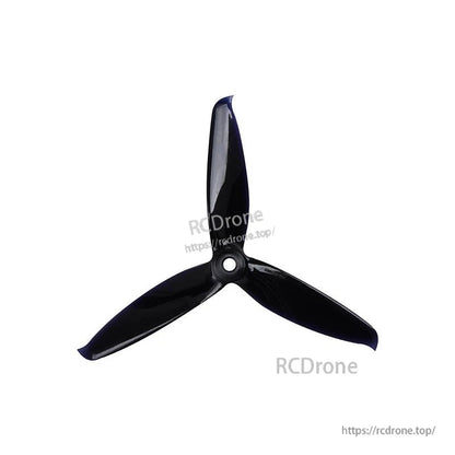 Black tri-blade propeller top view showing glossy blades and circular center mounting hole