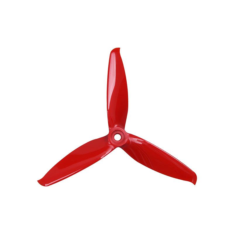 Red 3-blade FPV drone propeller, top view showing tri-blade profile and center hub mount hole