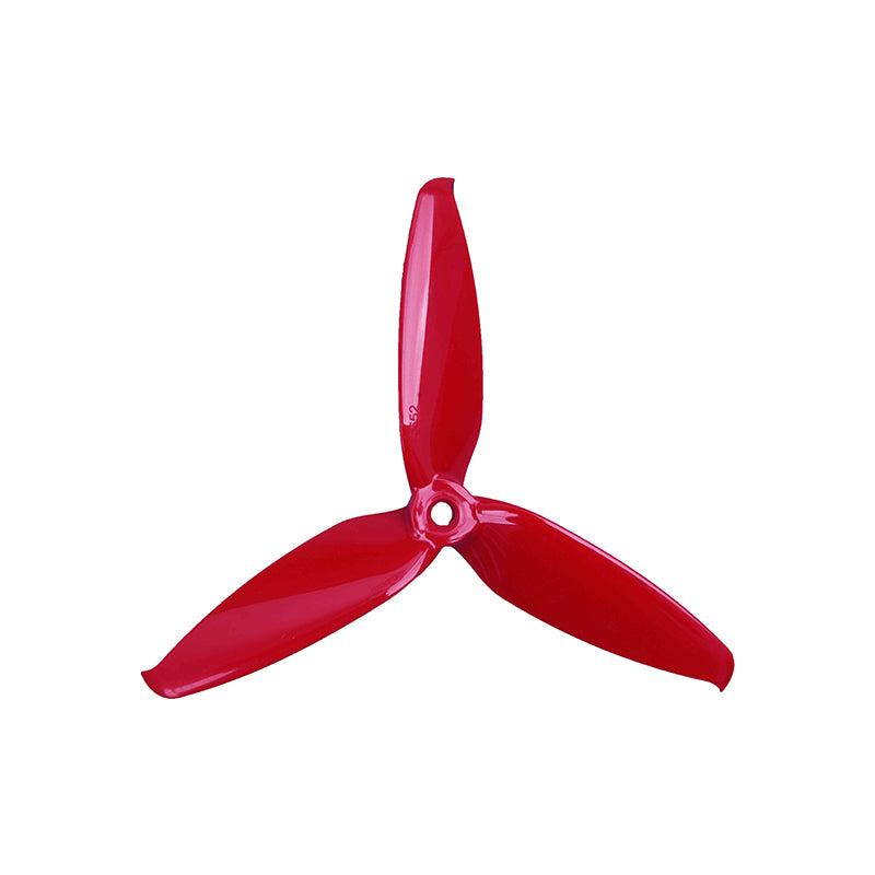 Translucent red 3-blade FPV drone propeller, top-down view showing hub and blade shape